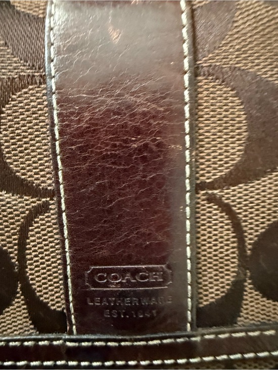 Coach Signature Canvas Shoulder Bag in Brown. Matching Coach wallet main image 3